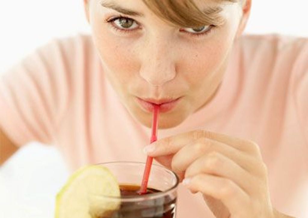 woman drinking soda
