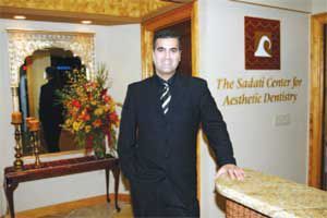 Dr. Sadati standing in his practice