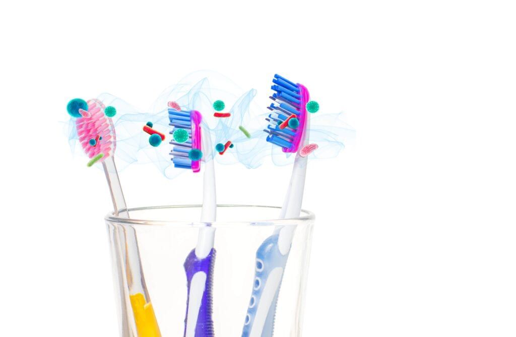 germs spreading between close toothbrushes